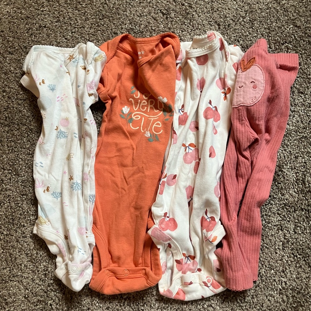 Set of Carter’s Baby Onesies